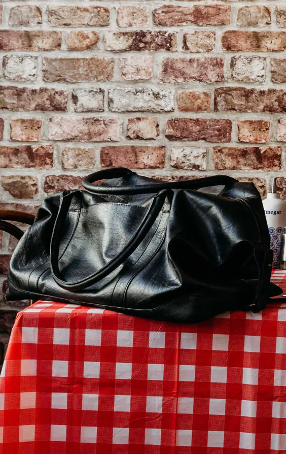 Schwarze Leder Reisetasche - photo 4
